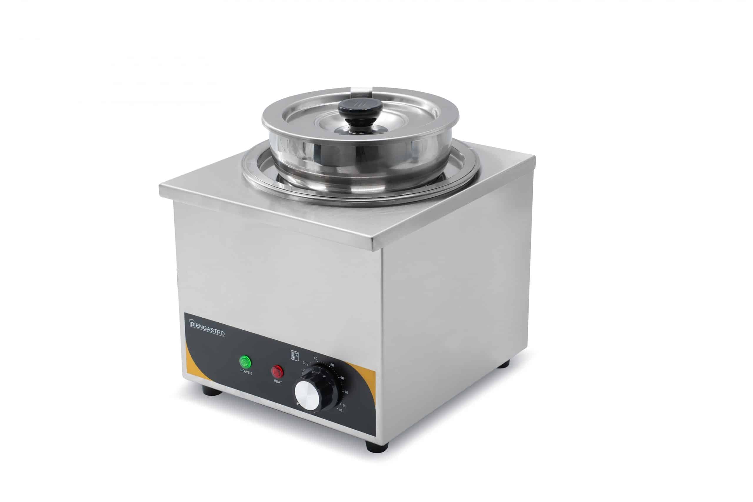 Commercial bain marie keeping food warm on a buffet line in a professional restaurant kitchen